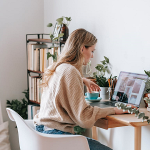 woman working on laptop at home