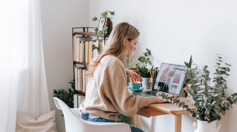 woman working on laptop at home