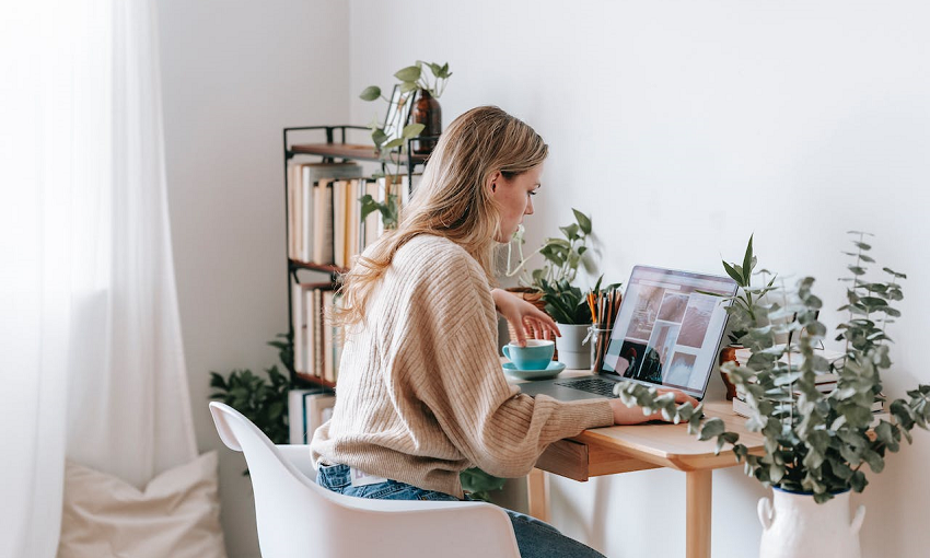 woman working on laptop at home