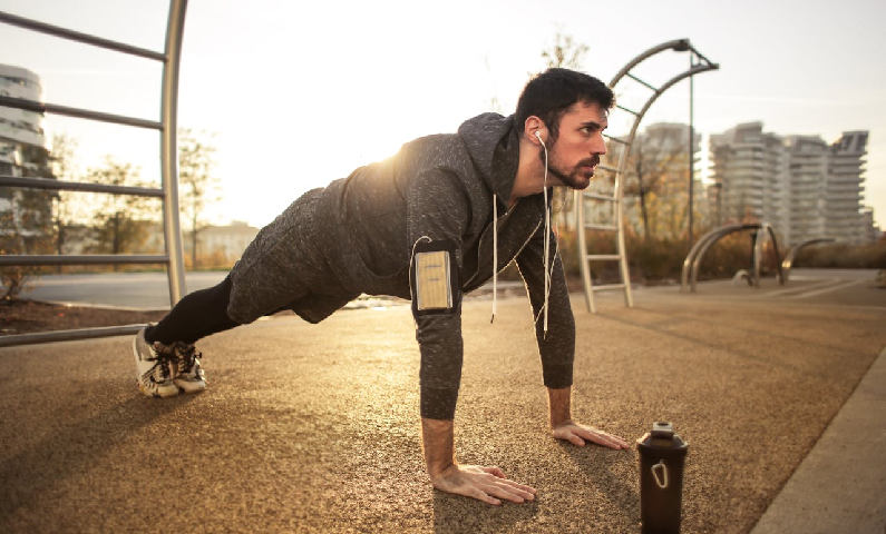 man exercising outside in the morning