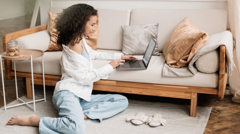woman working on laptop at home