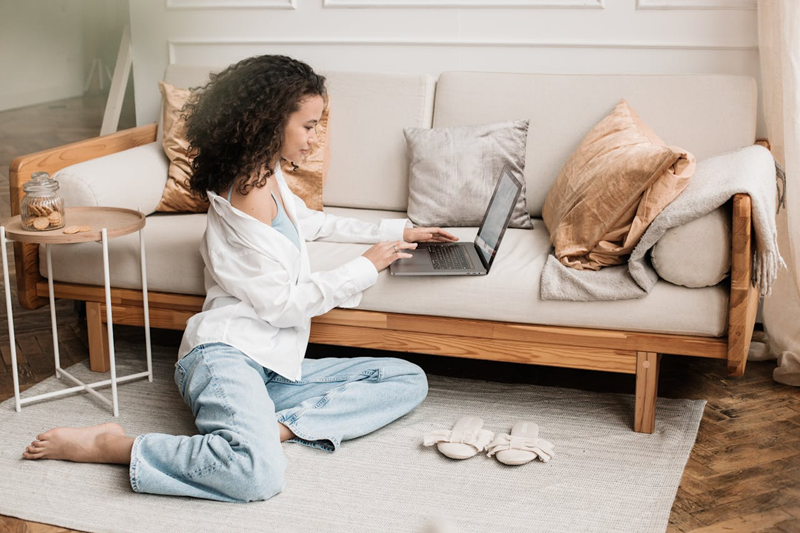 woman working on laptop at home