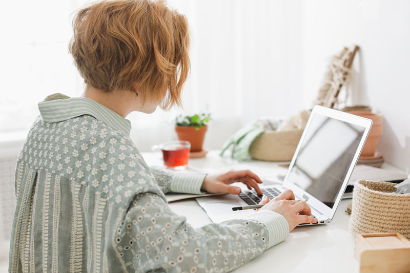 woman working on laptop
